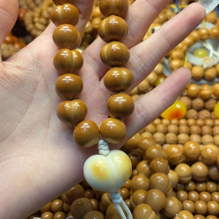 倔***_手串猴头核桃全品屁桃加爱心