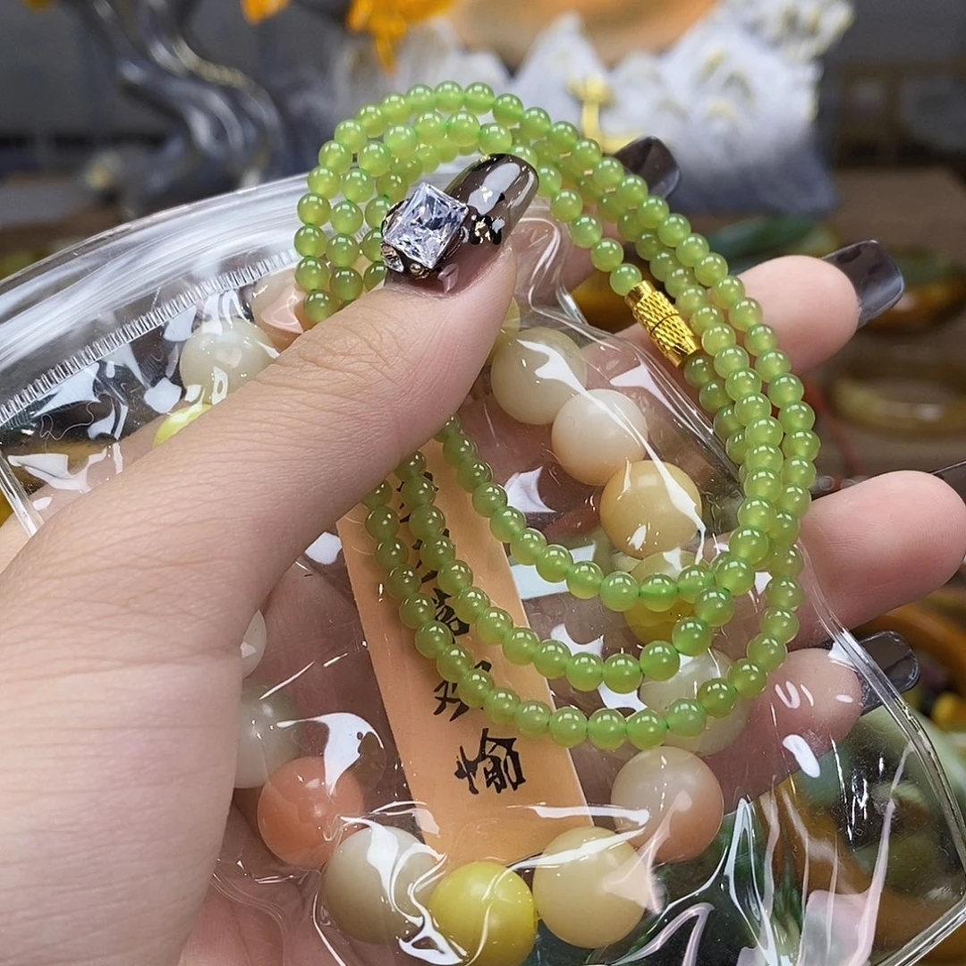 小***莉未镶嵌蛇纹石玉手镯