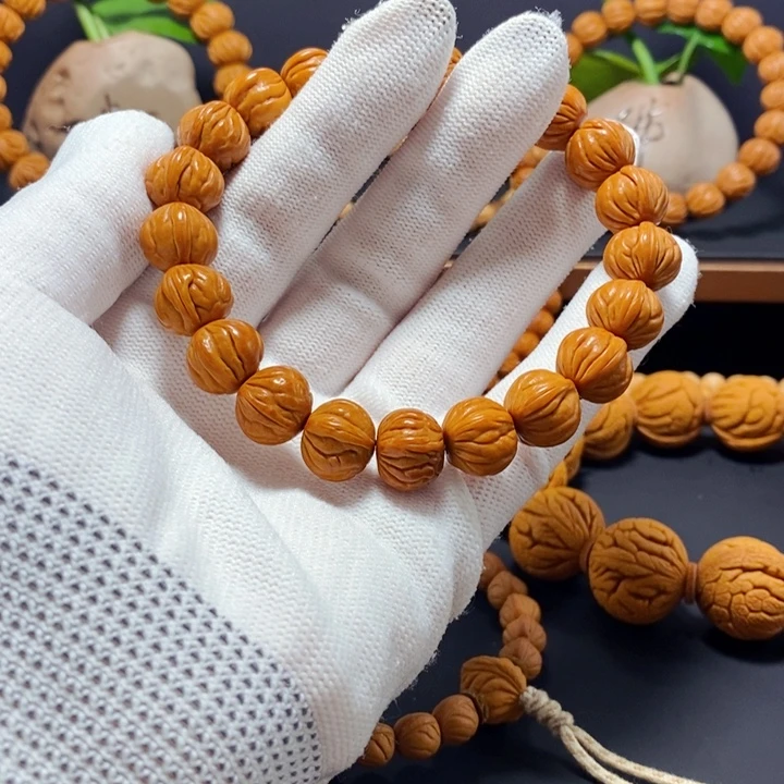 手串桃核柿子红手串