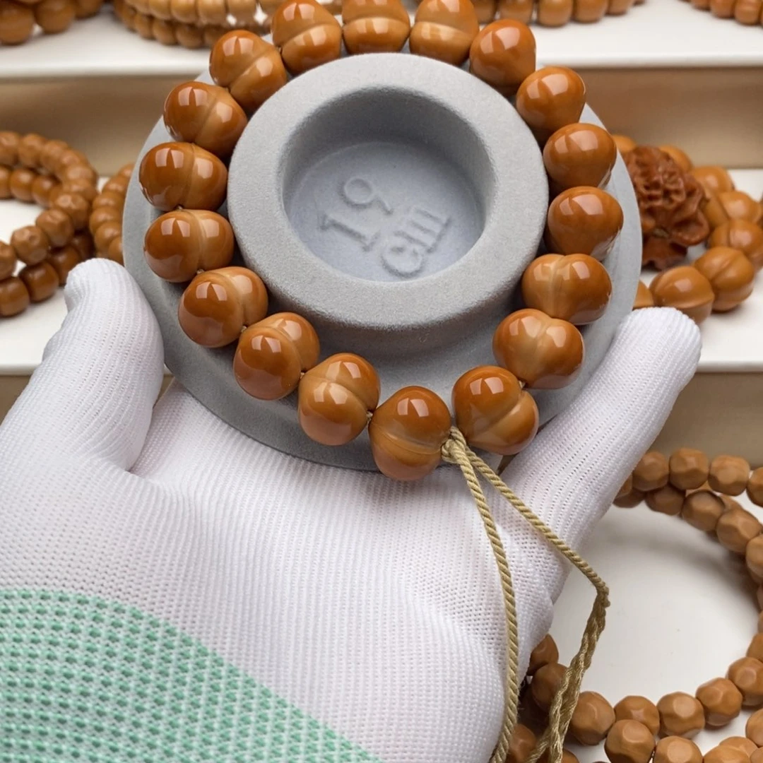 是***仔猴头核桃手串屁桃