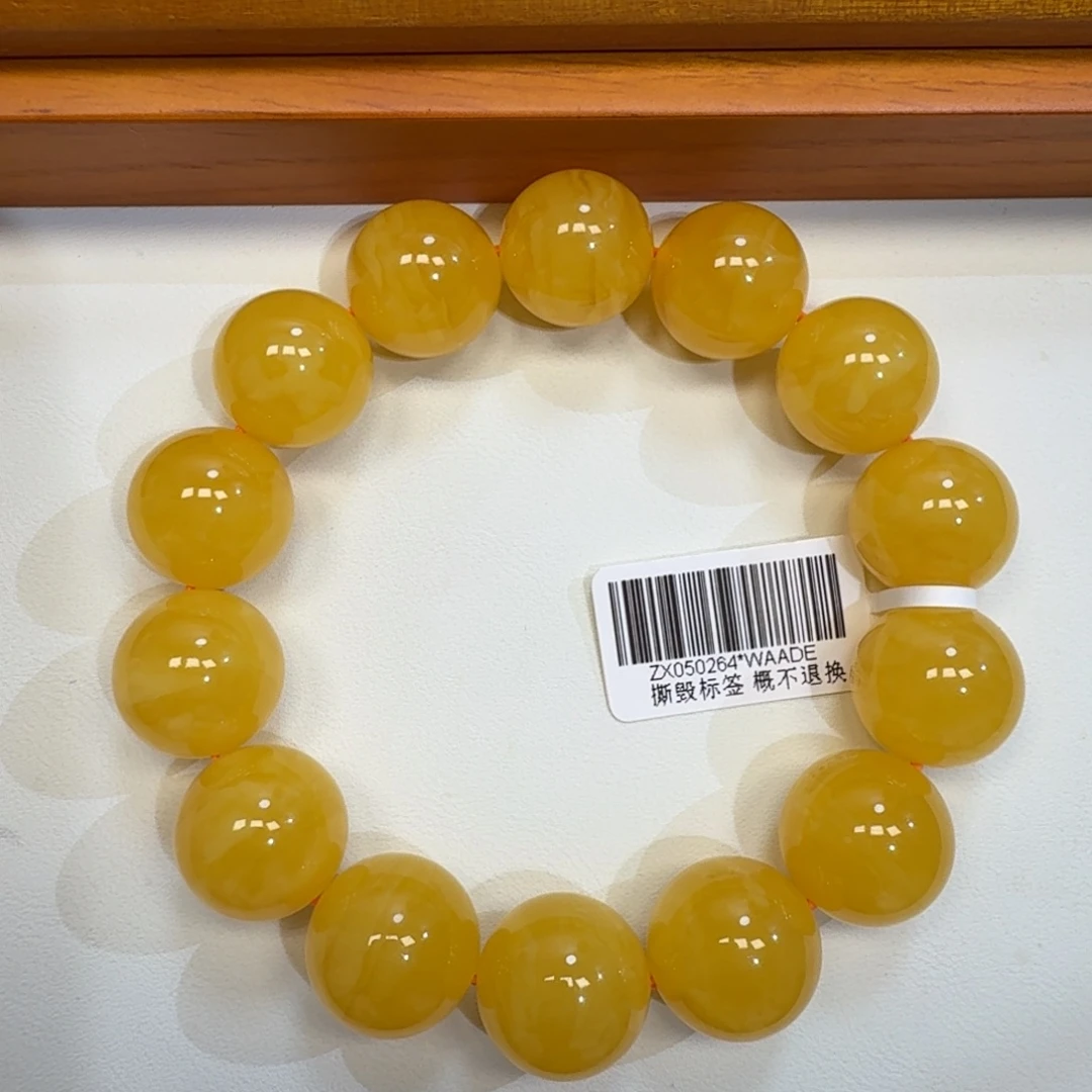 琥珀未镶嵌珠宝奇石16.2m焦皮同料橘黄浓蜡圆珠手串33.5
