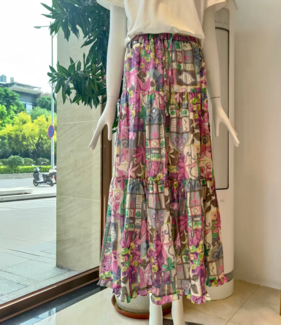 2025年夏季新款麻料花色复古风波西米亚度假风印花涂鸦长款半身裙