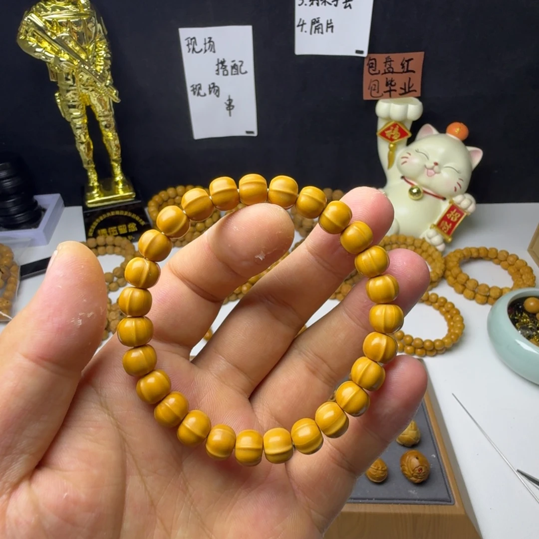 卖***狗吊坠猴头核桃鲨鱼