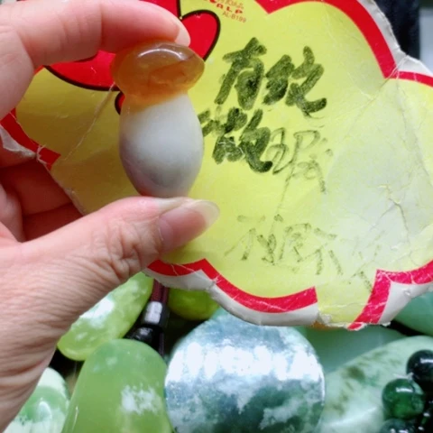 未镶嵌蛇纹石玉手把件
