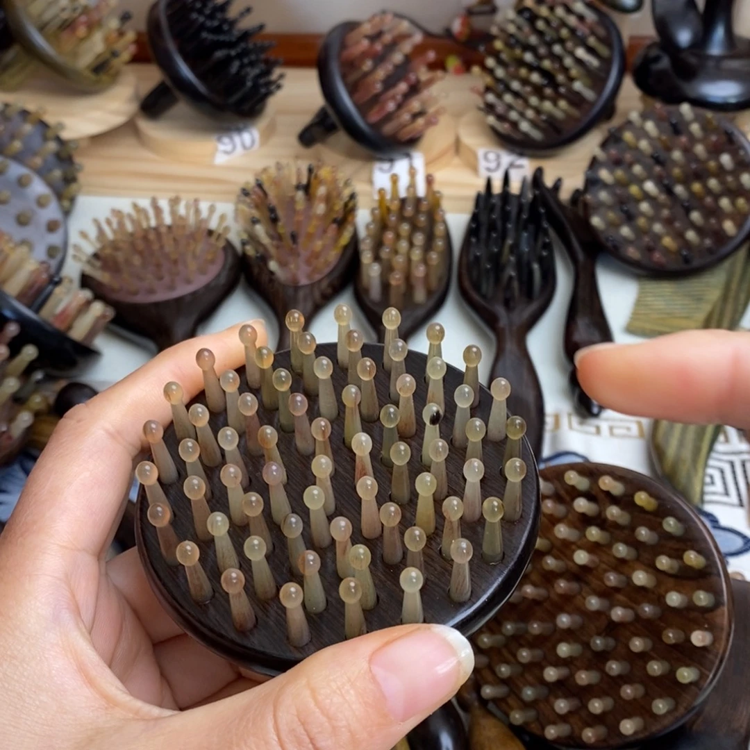 紫光檀64齿按摩梳子