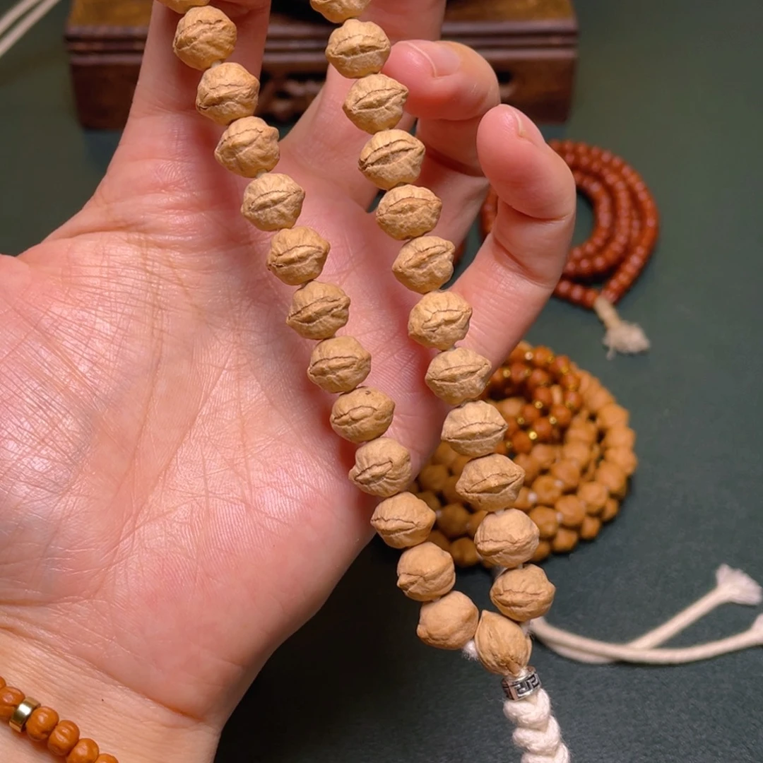 吊坠柏香籽/百香籽凤眼手持