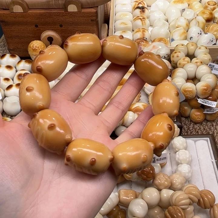 菩提根/象牙果把件12.8.40象牙果炭烤法棍熊微瑕
