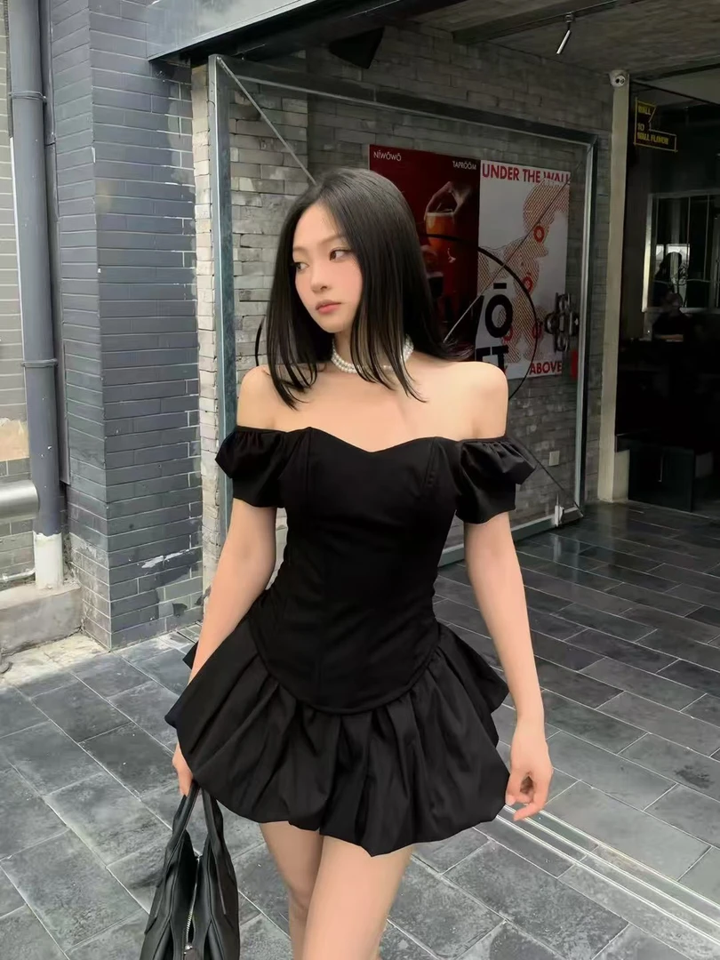 美奈美衣高级感黑色鱼骨摸胸上衣当地高腰泡泡裙两件套