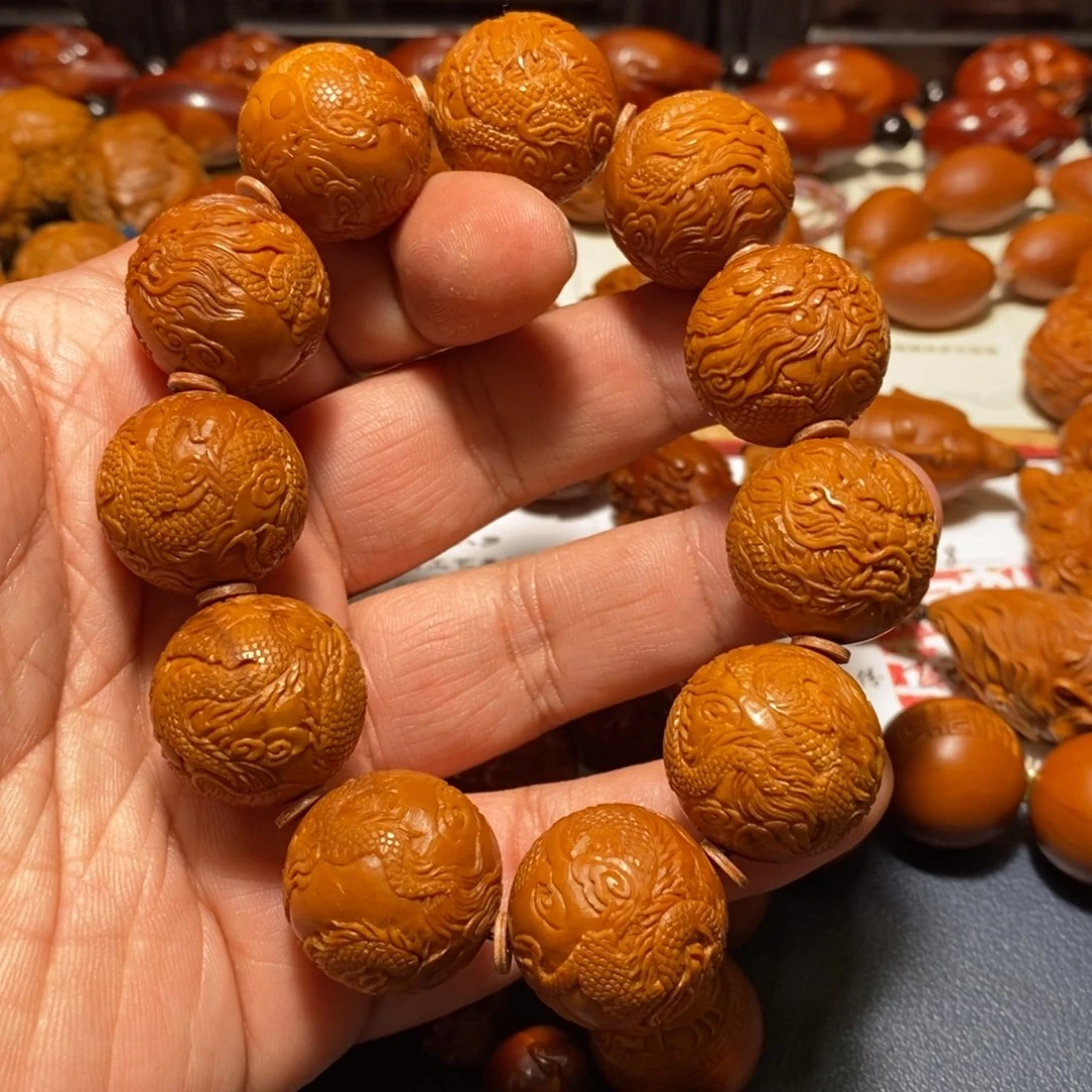 辰***瑜橄榄核手串/手链觅核链接