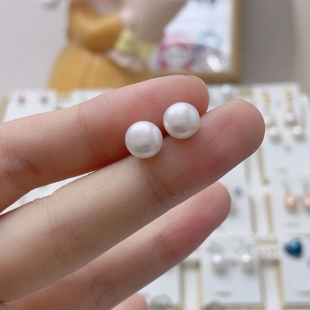 6***7淡水珍珠银S925镶嵌耳饰
