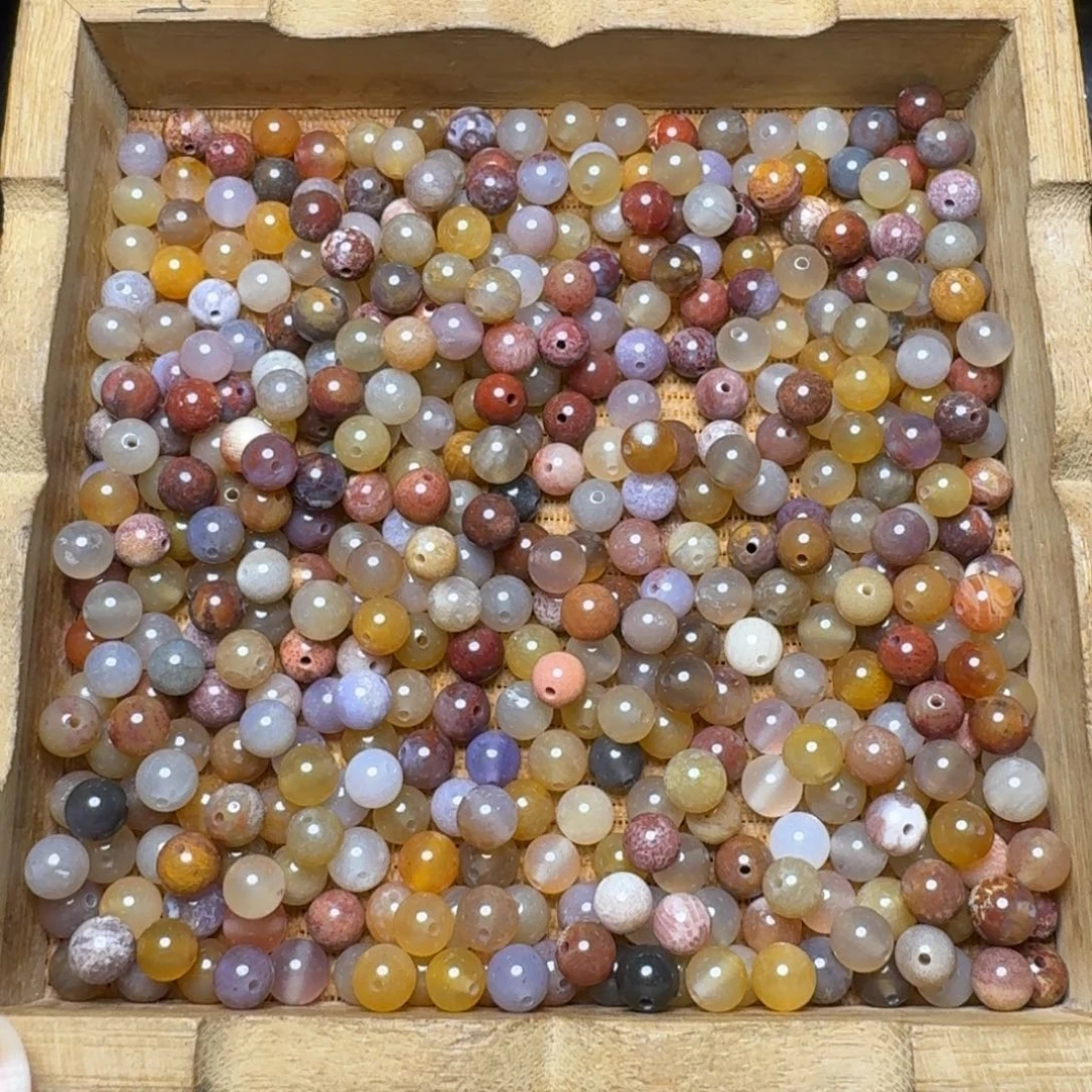 ღ***ღ硅化玉未镶嵌5.5咪彩珠100克160