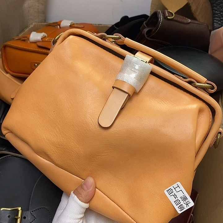 黄牛皮瑕疵大单肩包手提