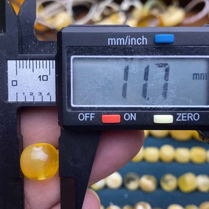 琥珀未镶嵌裸石36号11.7*10.2喇叭口微瑕