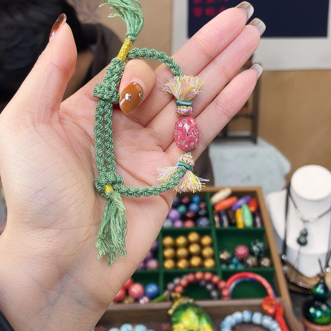 粉色枣珠编制手链
