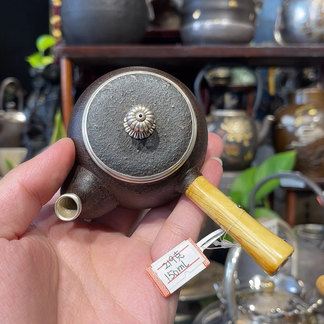 遐***想纯银名家作品铁包银侧把银壶