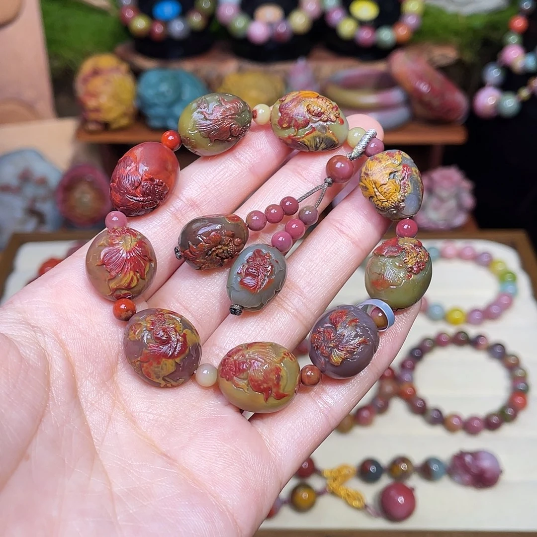 玛瑙/玉髓未镶嵌手串盐源玛瑙彩浆包浆金鱼蛋蛋手串