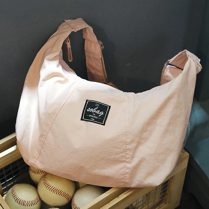 SoBag日系休闲单肩斜挎饺子包女小众设计感百搭通勤防水尼龙布包