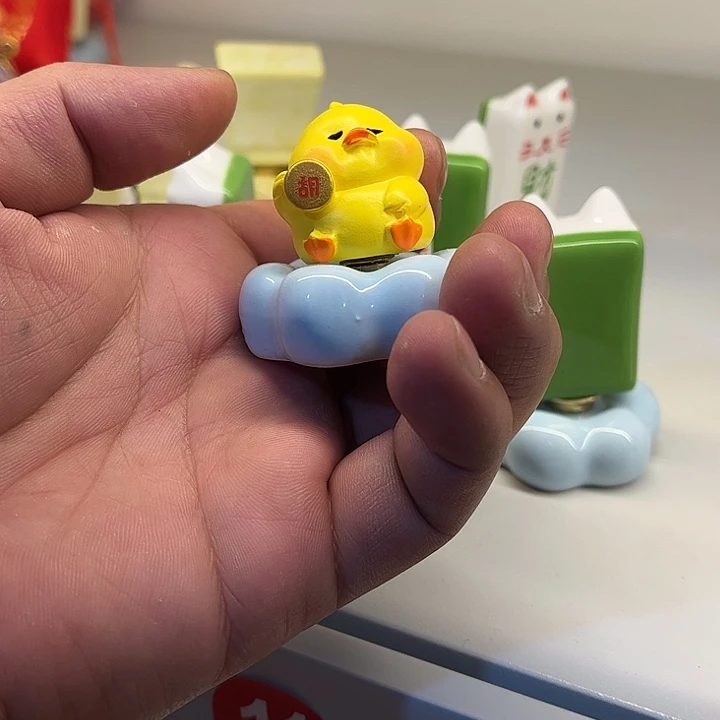 一***牌陶摆件转转摆件，树脂把把胡鸭子