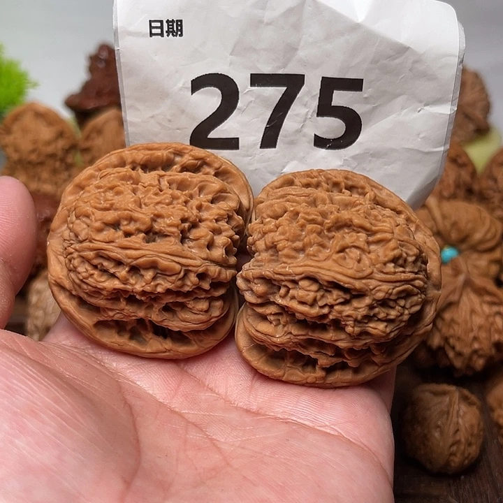 桃核把件全 南疆石 边46。  275