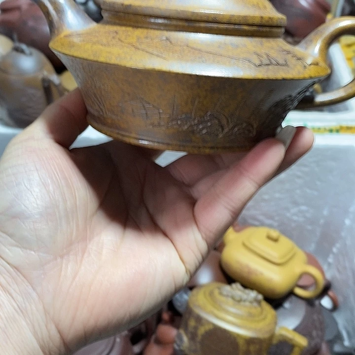 紫砂茶壶磕碰微笑