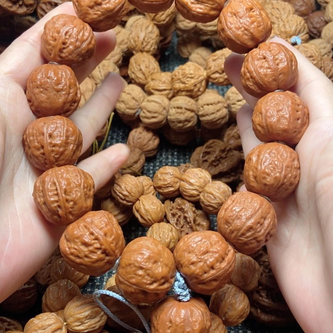 吊坠桃核光头手持