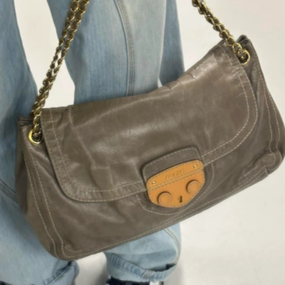 95新 Prada/普拉达 猪鼻子大号机场包