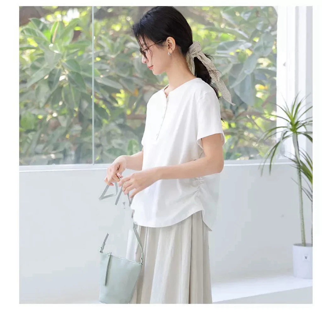 27912欧货高货扣子装饰下摆不规则TS5008衣长61