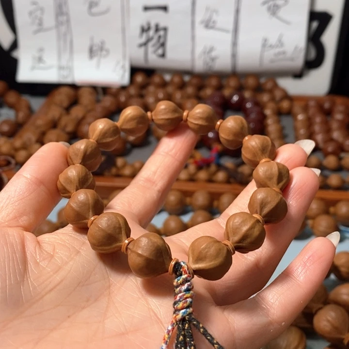 橄榄核手串4131精品蒜头铁核14+1颗