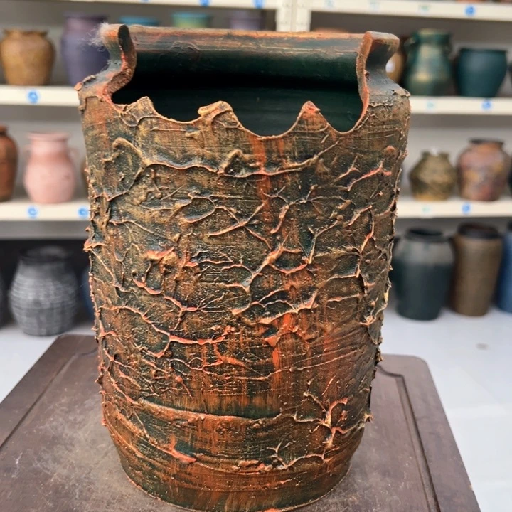 15.9-1微瑕土陶24红浮缺口