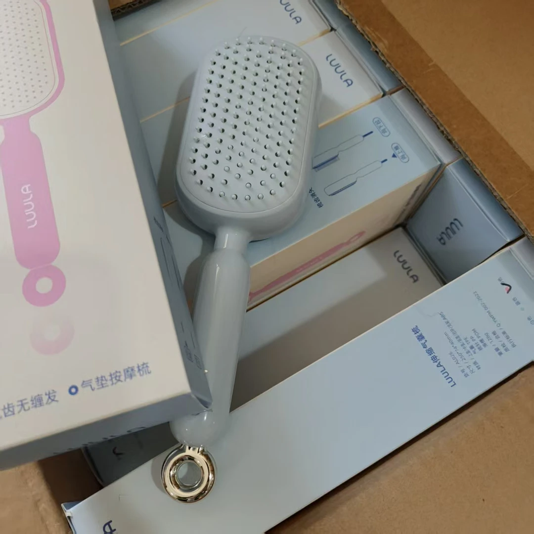 百货3 蓝色伸缩气垫梳