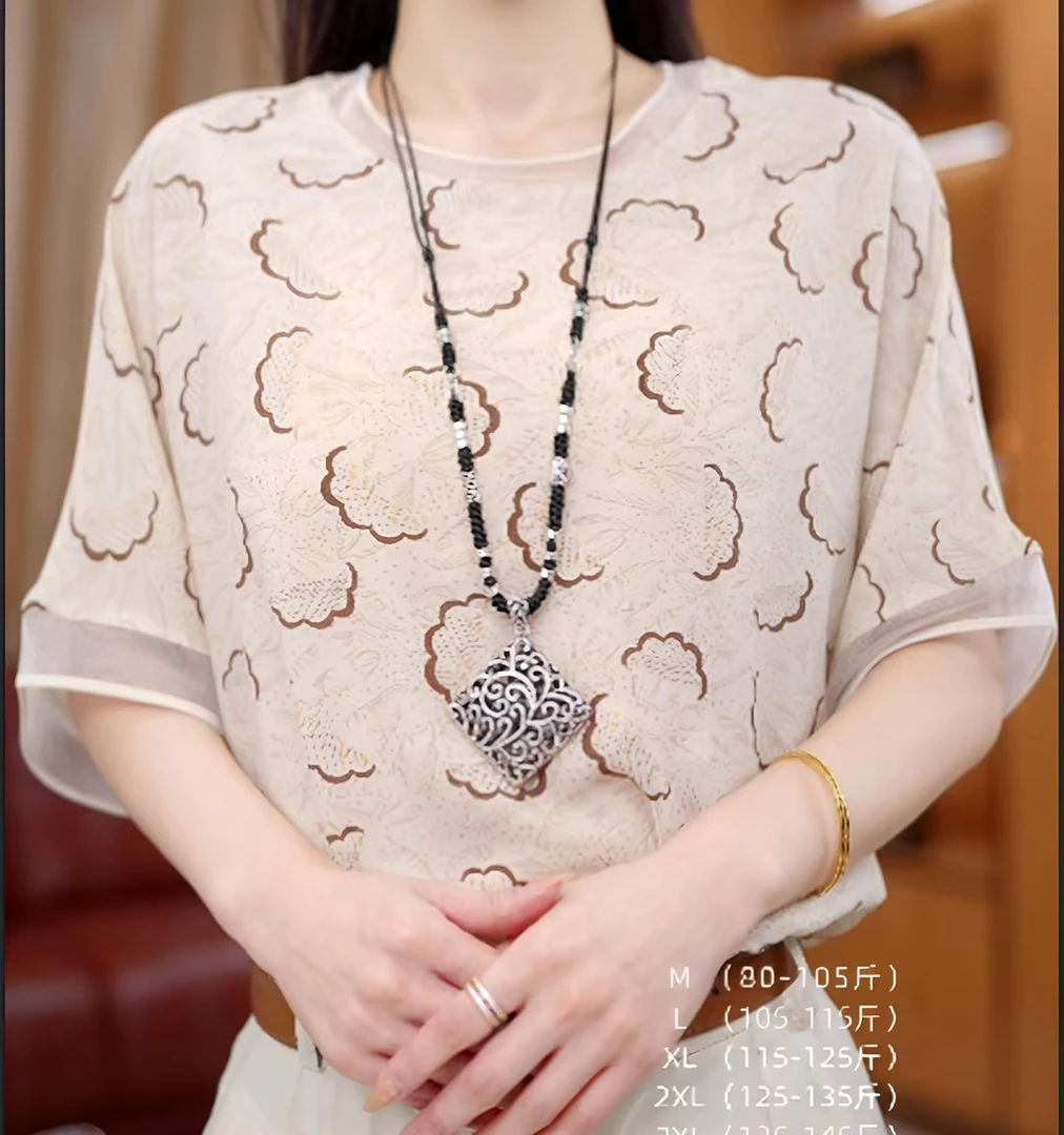 三2025新款洋气女装百搭贵气宽松印花圆领气质透气短袖上衣2506#