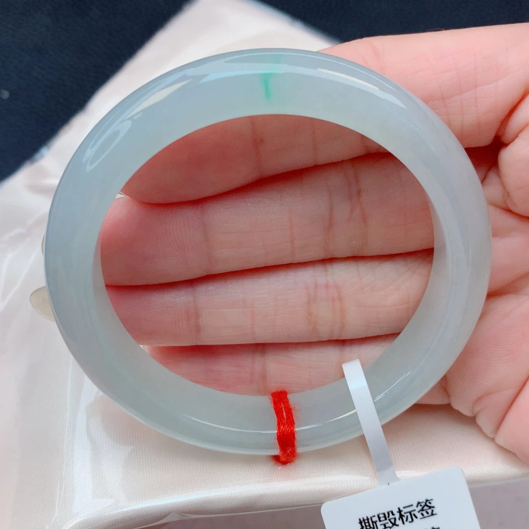 翡翠未镶嵌手镯53.3圈 细糯冰浅绿底飘抹金丝绿完整