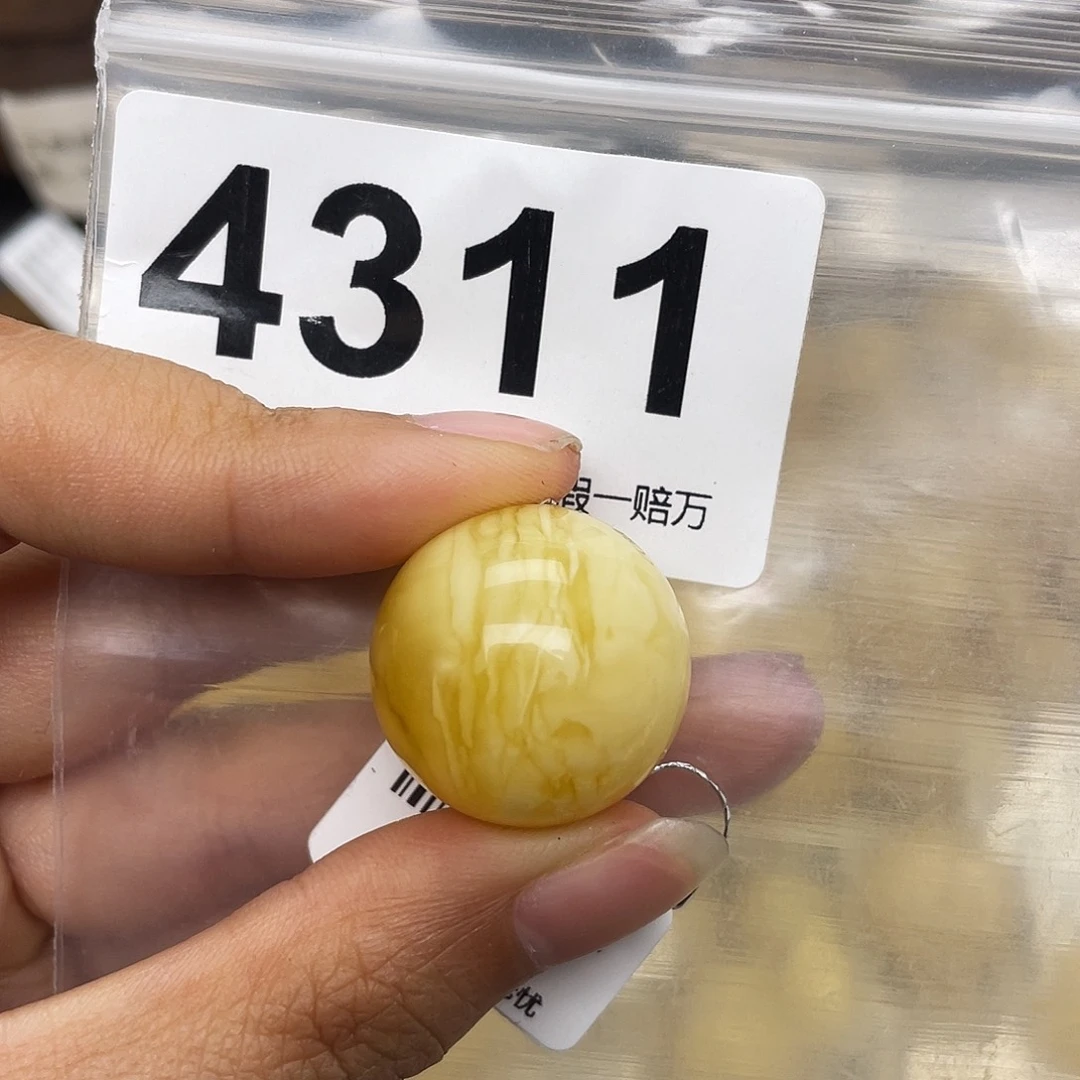 叶***菊蜜蜡未镶嵌珠宝奇石21.9