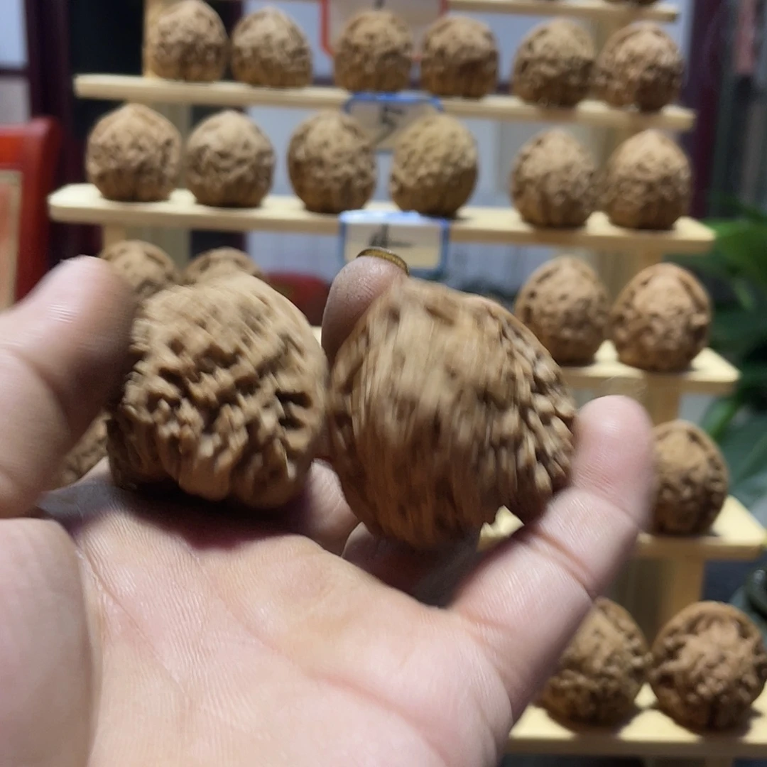 苞***子桃核吊坠文玩核桃南将石