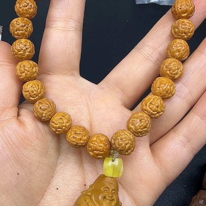 橄榄核吊坠清货一个月的