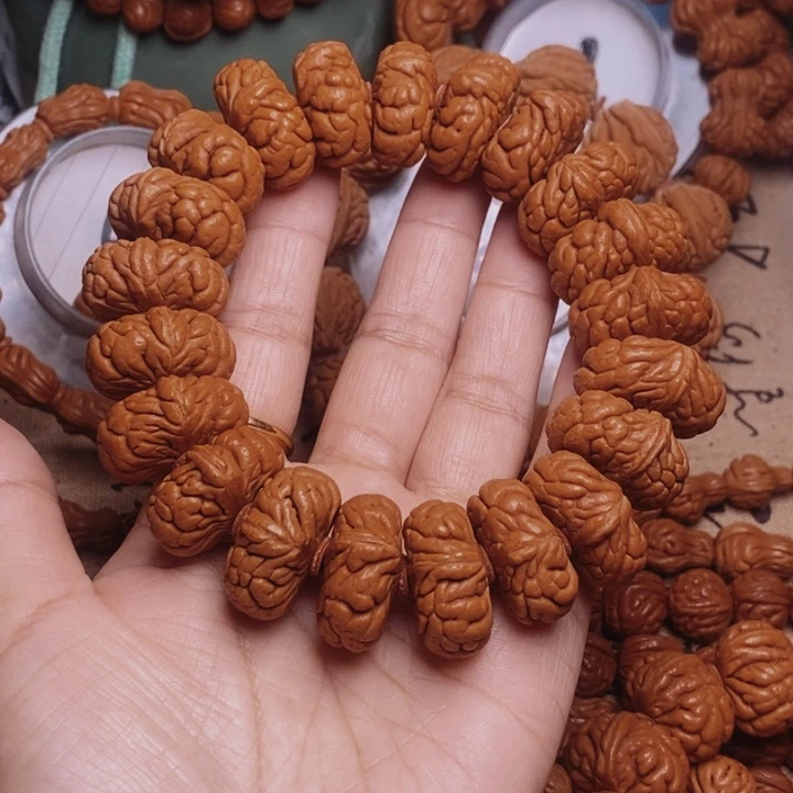 孤***飞文玩核桃手串龙纹桃核
