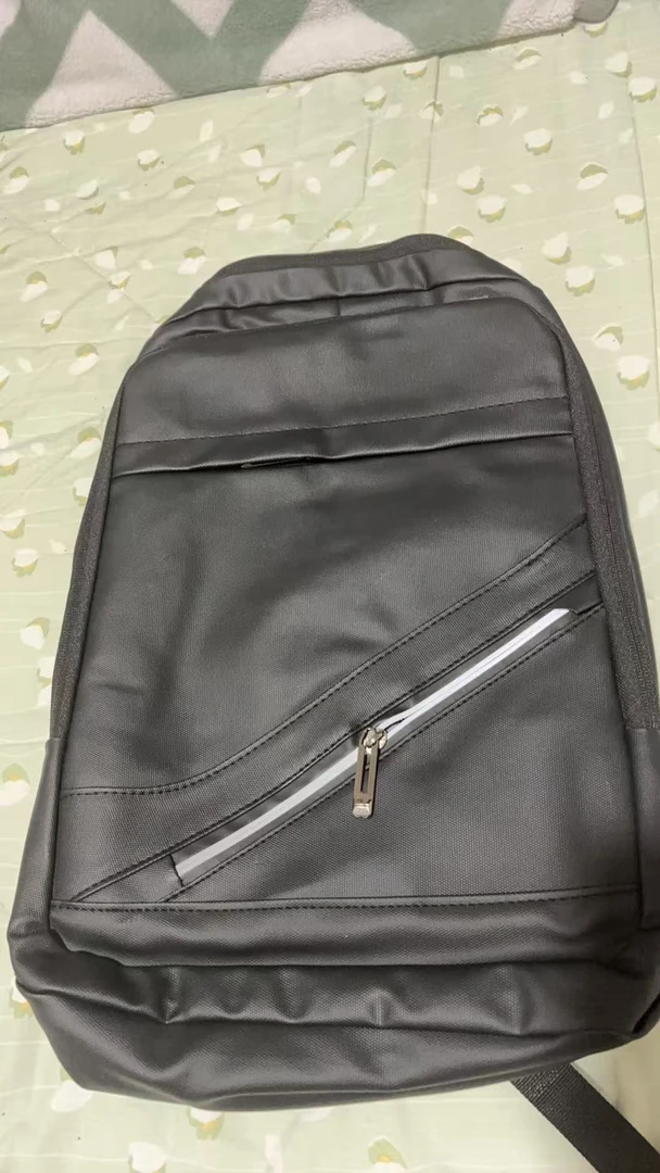 时尚书包大容量减负护脊双肩背包男