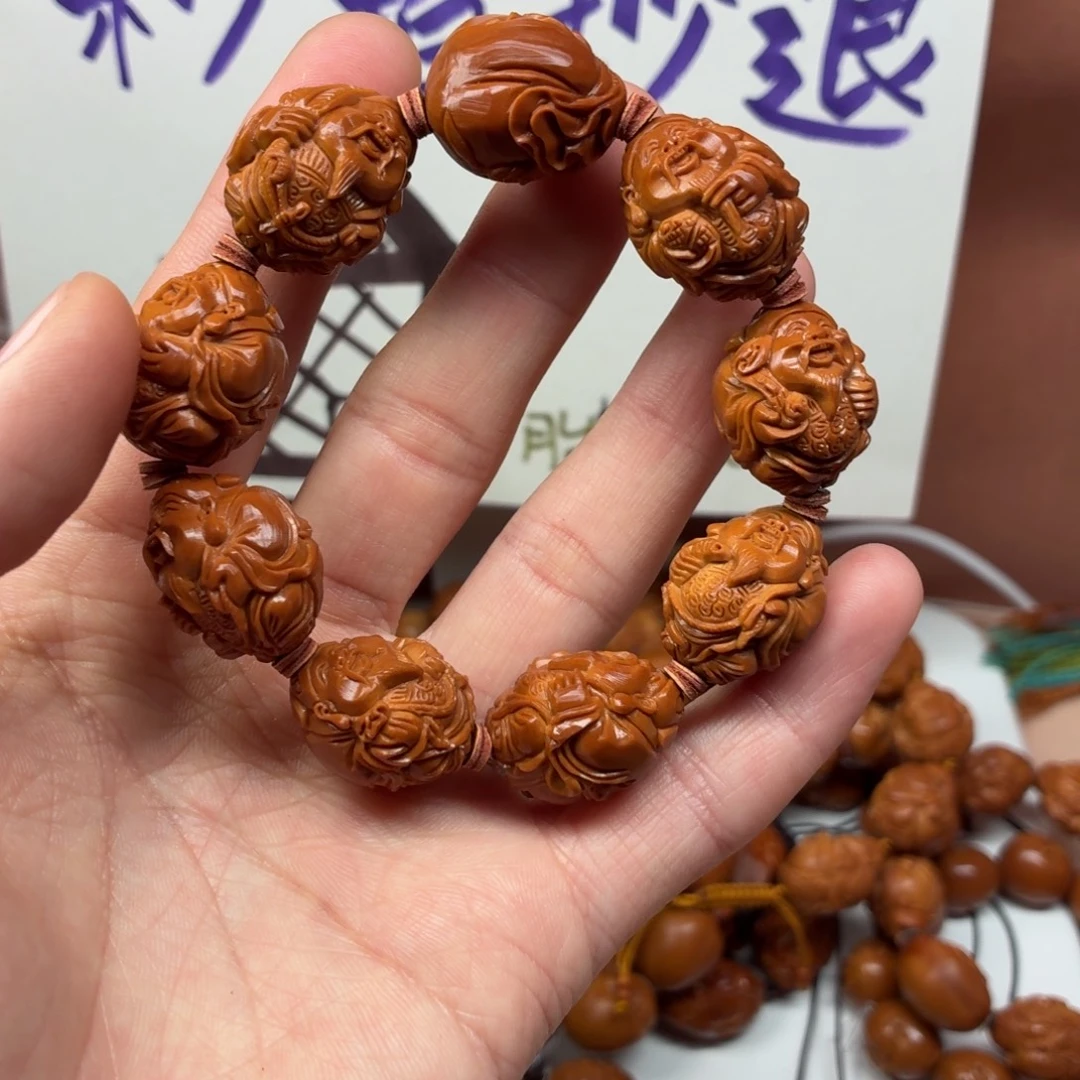 橄榄核吊坠小财神