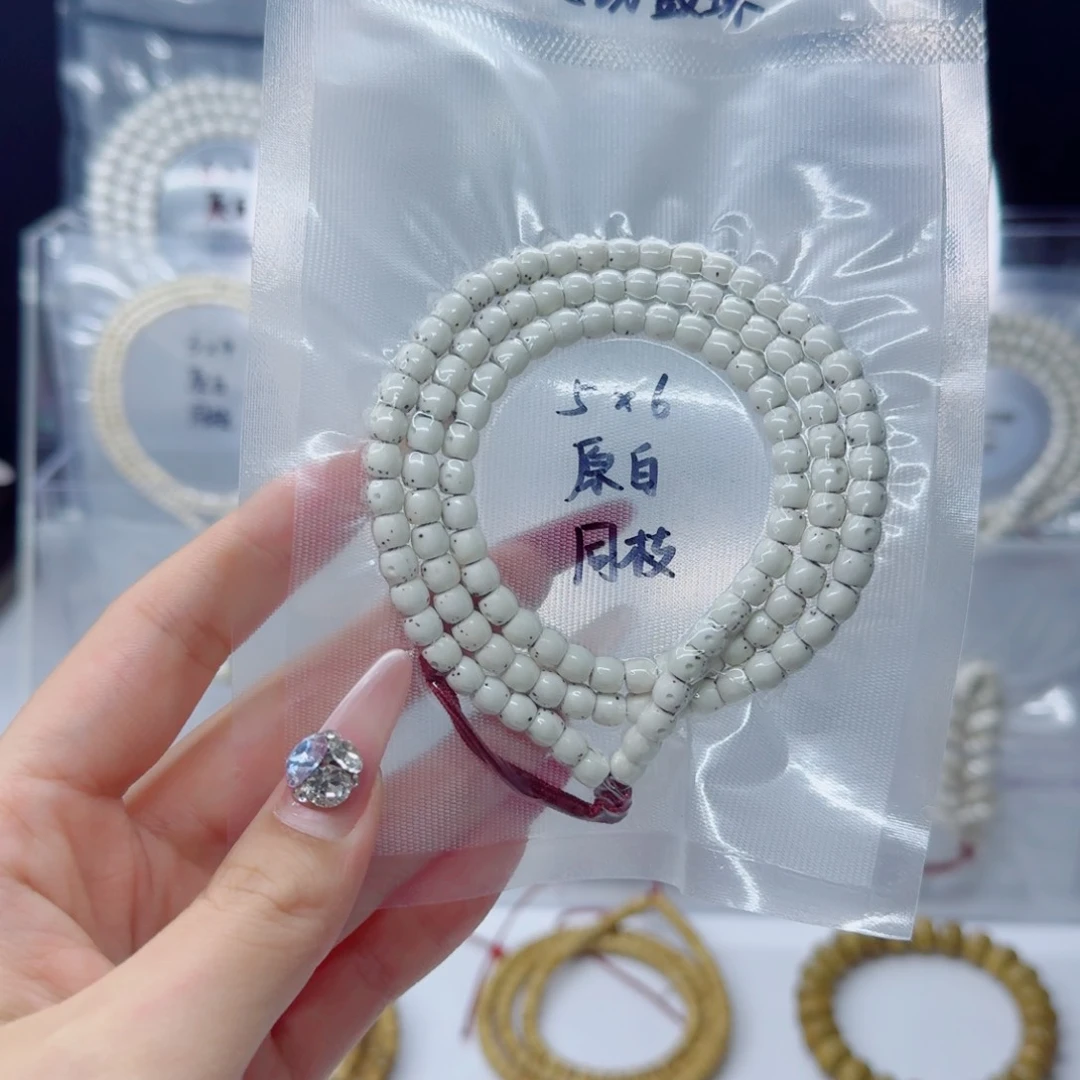 梵***蘇吊坠星月菩提6*5原白直切鼓珠带月贯通