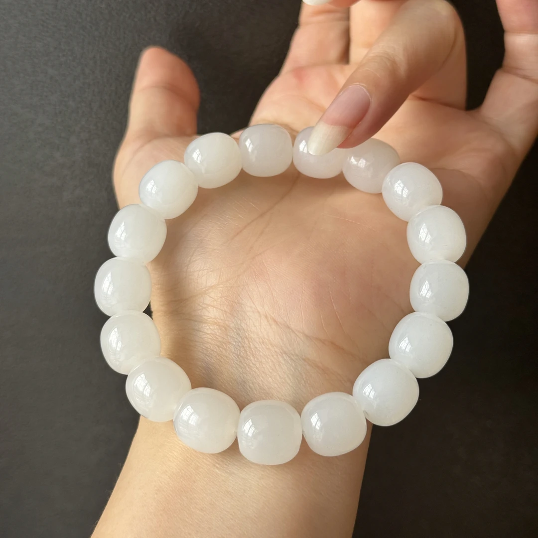 新疆高白于田和田玉极致弧手串11*12