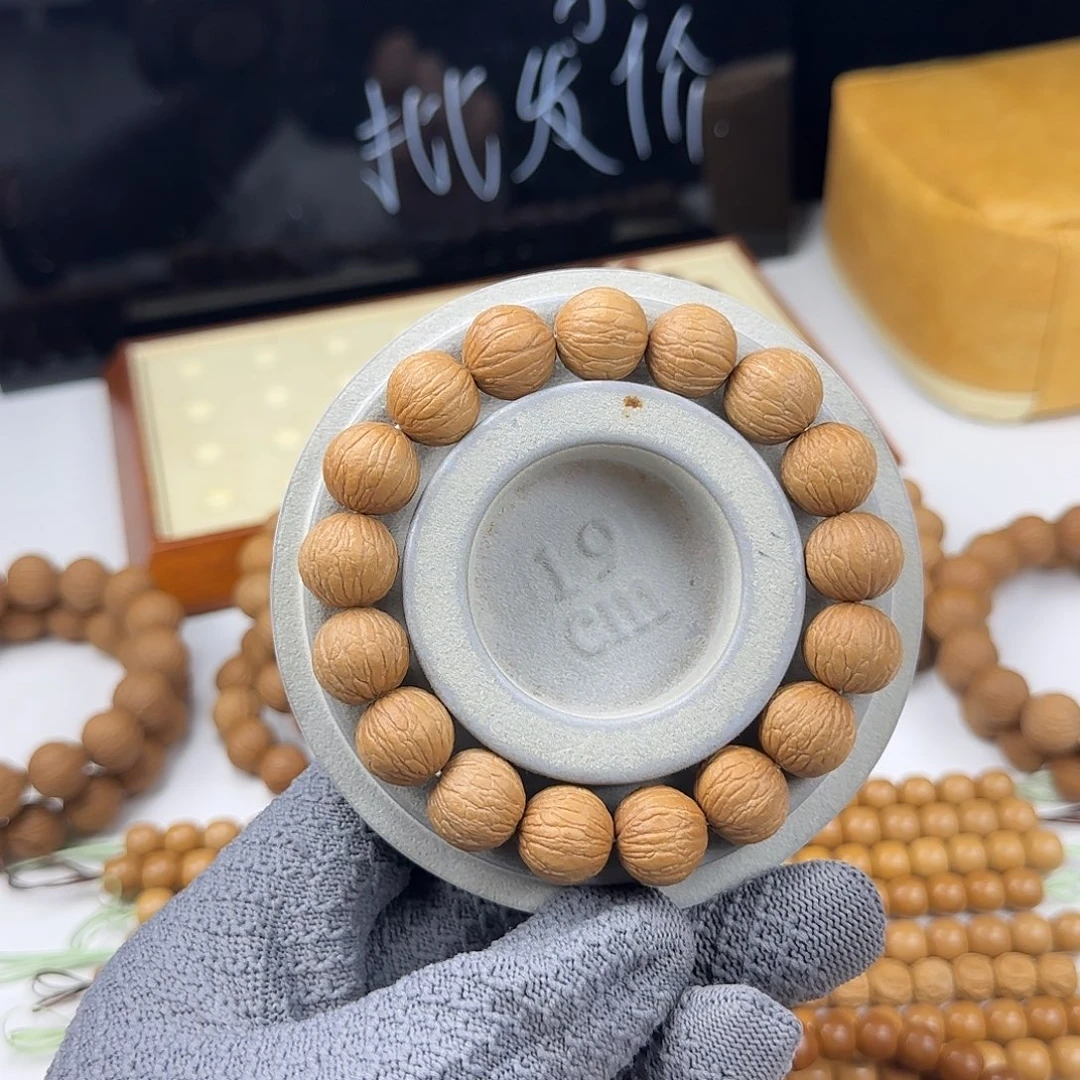 吊坠猴头核桃凤羽