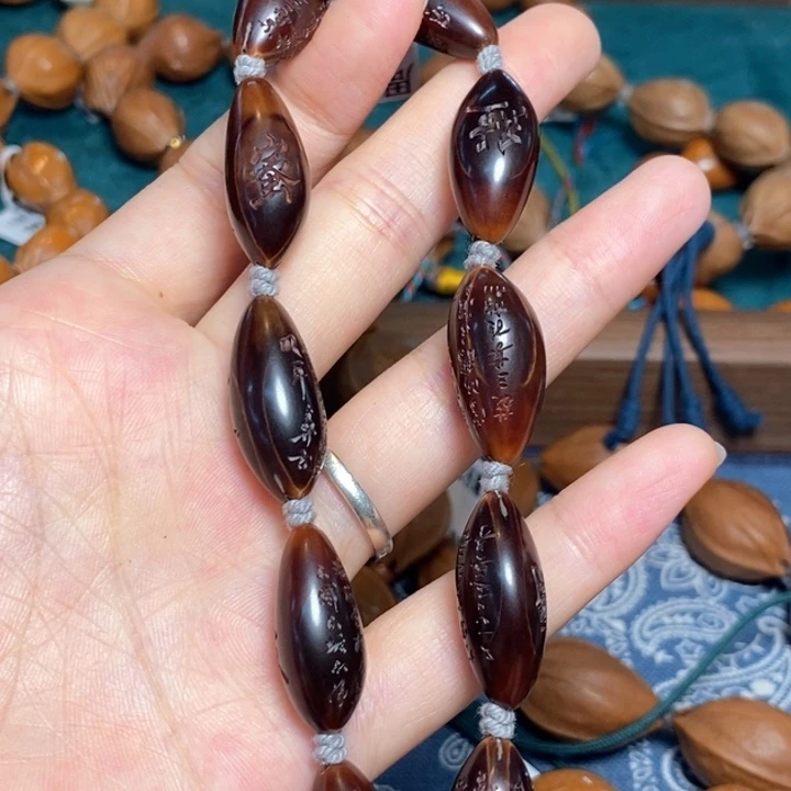 橄榄核手串/手链紫皮心经