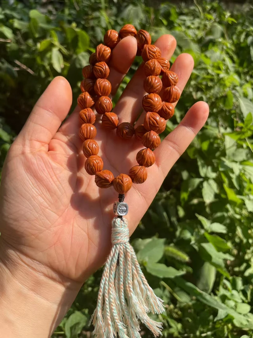 秦岭野生皮质油润纯野生高山小尺寸手持龙纹桃核