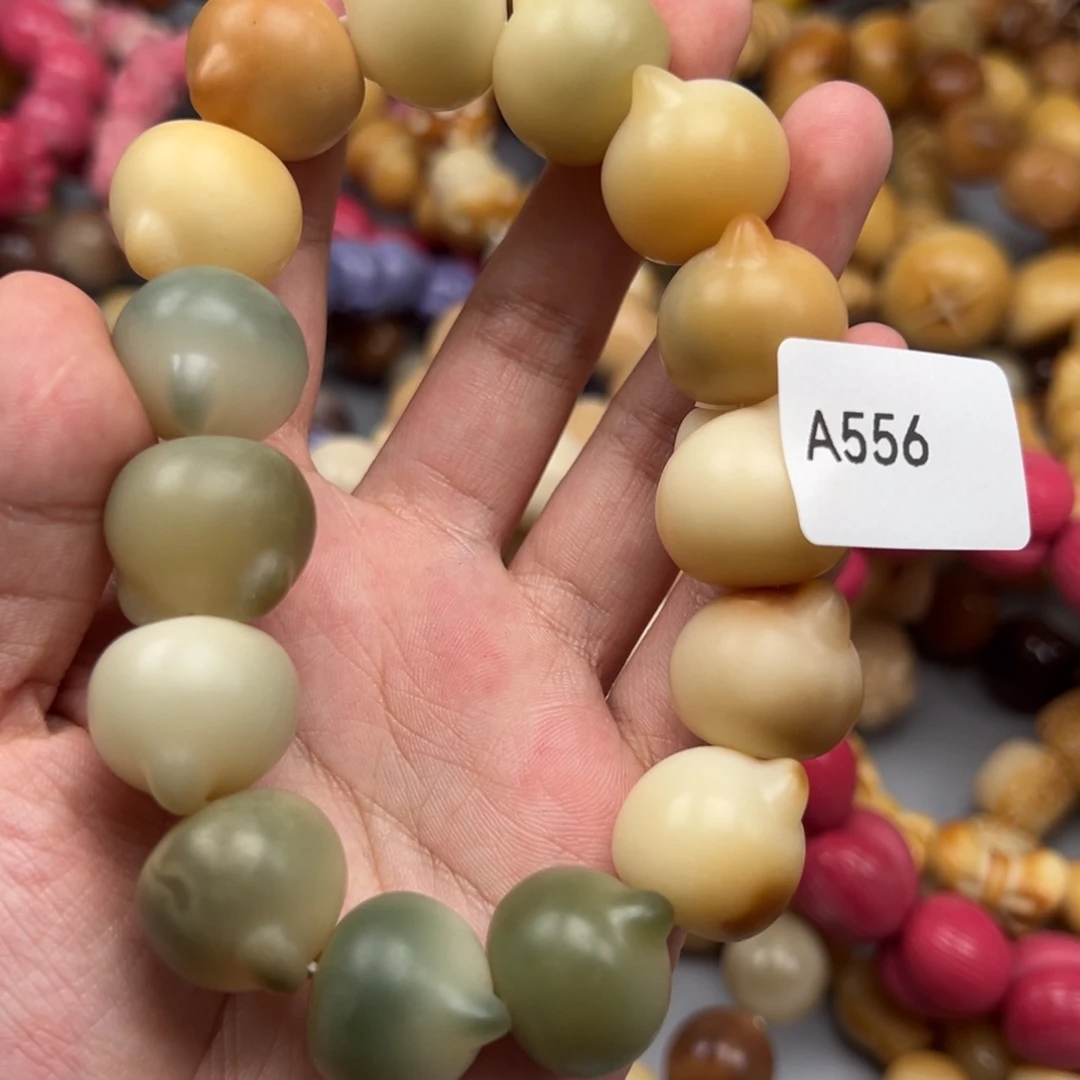 右***华菩提根/象牙果吊坠A556猫头19-20微瑕一串