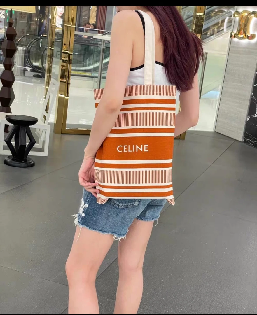 未使用 Celine/思琳 Celine橘色条纹帆布袋 129583