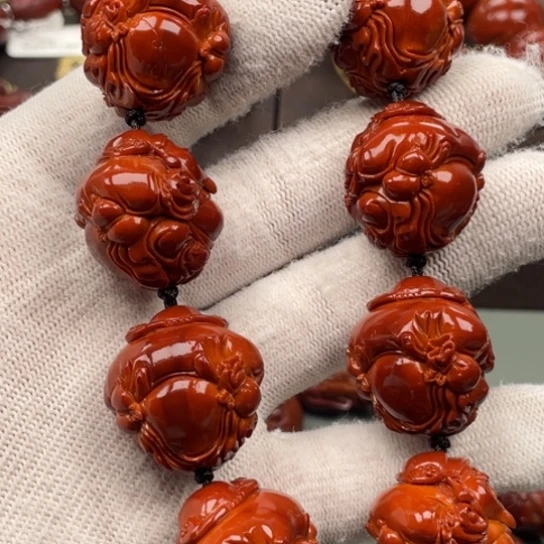 咯***局橄榄核吊坠橄榄核