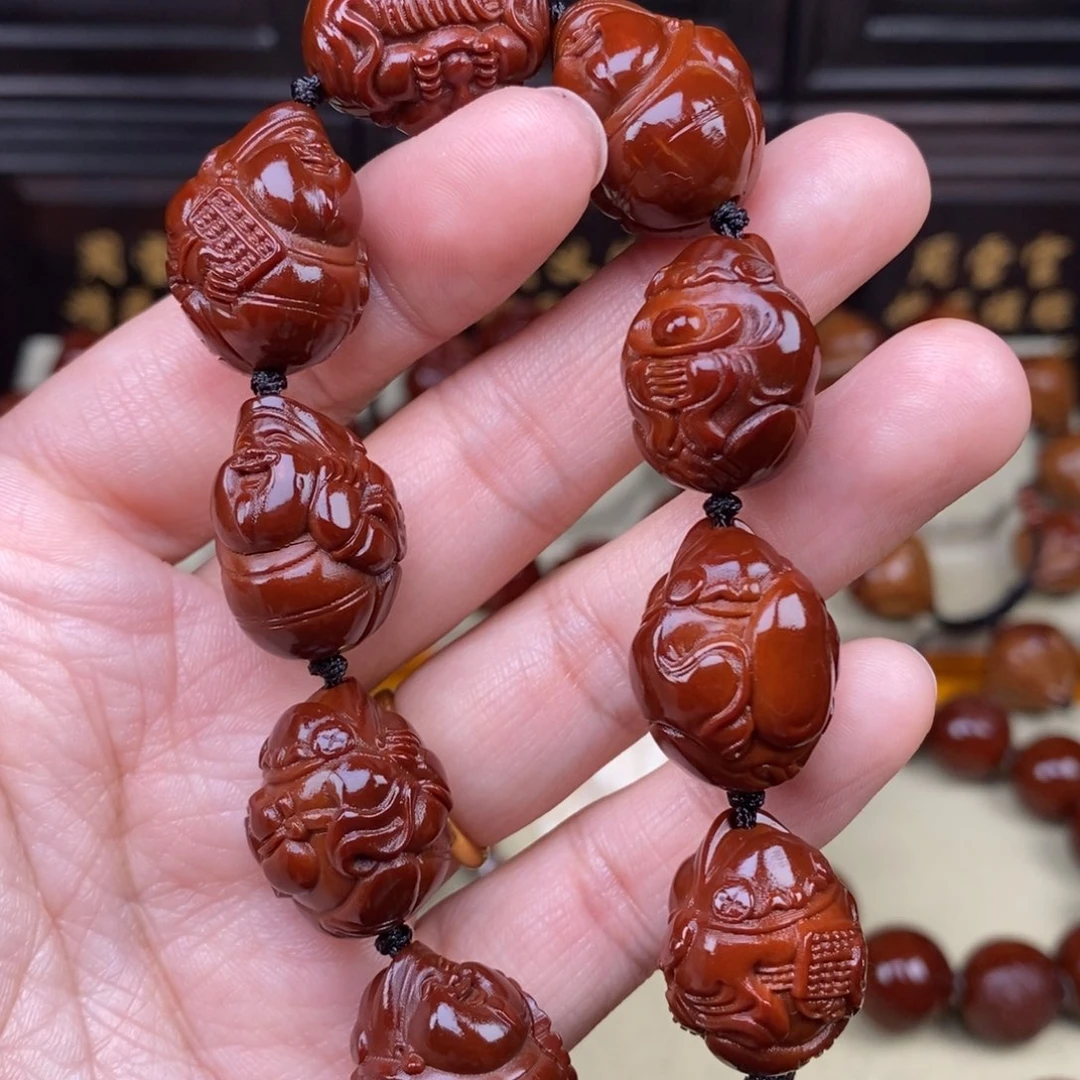 用***2橄榄核吊坠八宝财神