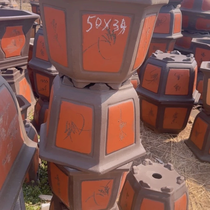 红陶口径50高34…………………………