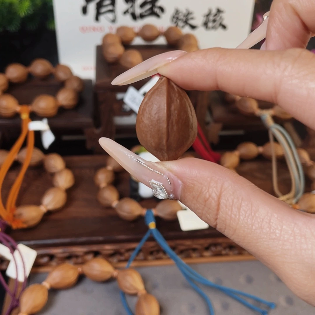 尔***！橄榄核手串原生态梅林铁核20三通