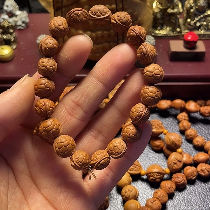 龙纹桃核雕刻瑕疵富甲天下